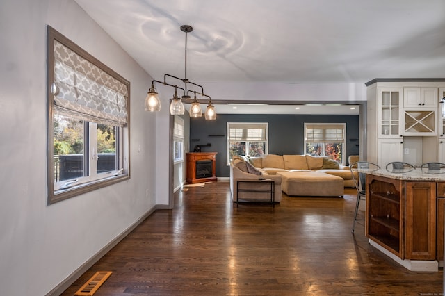 living room with dark wood-type flooring