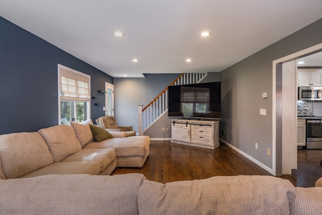 living room featuring dark hardwood / wood-style floors