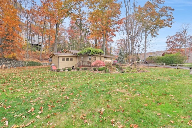 view of yard with a wooden deck