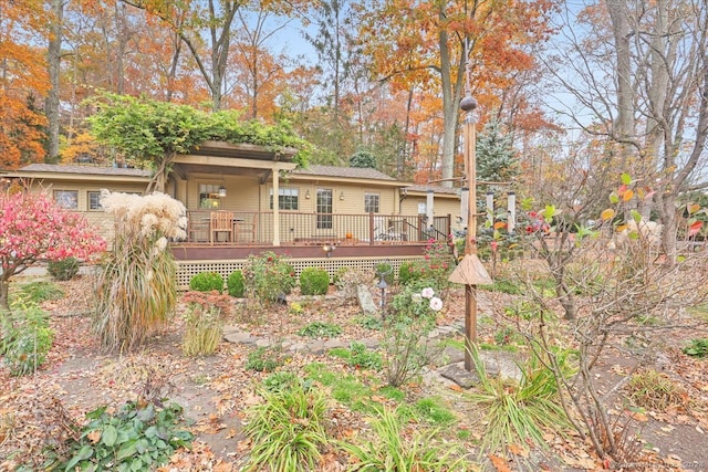 rear view of property with a deck