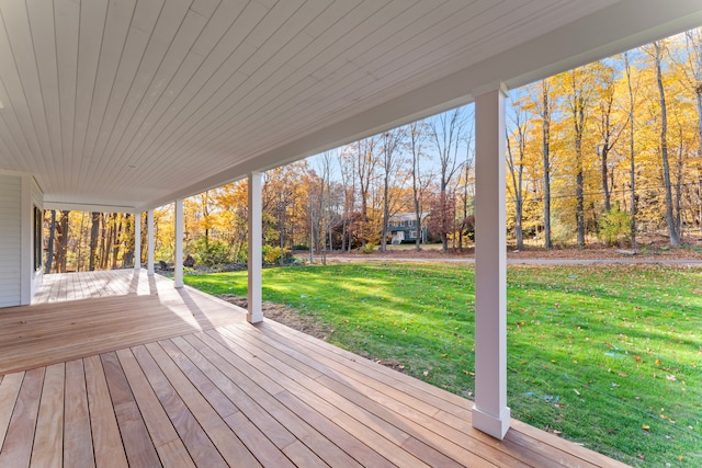 deck featuring a lawn