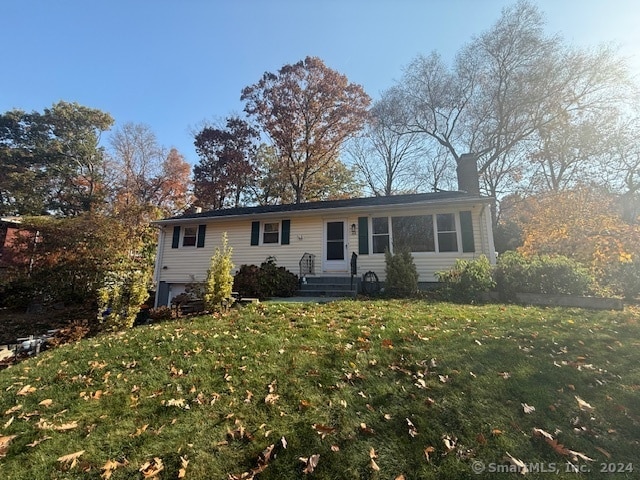 view of front of house with a front yard