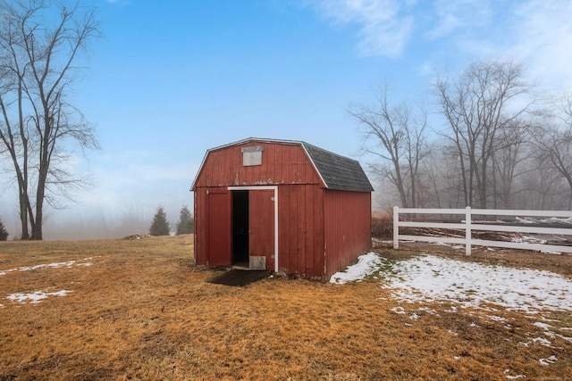 view of outbuilding featuring a rural view