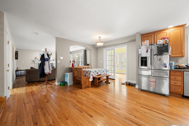 kitchen with light hardwood / wood-style floors and stainless steel appliances