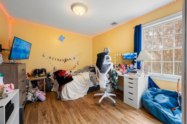 bedroom featuring light wood-type flooring