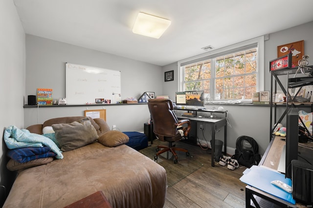 office space with hardwood / wood-style flooring