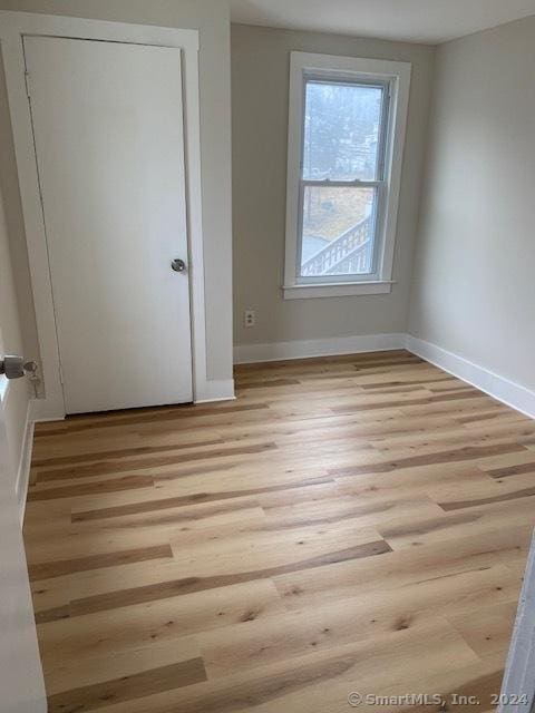 22-26 Hunters Ave, Norwich, CT 06380 - unfurnished bedroom featuring light wood-type flooring