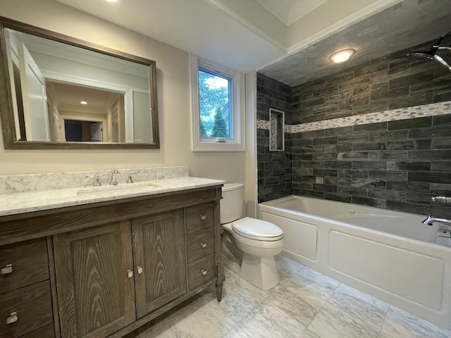 full bathroom with vanity, toilet, and tiled shower / bath combo