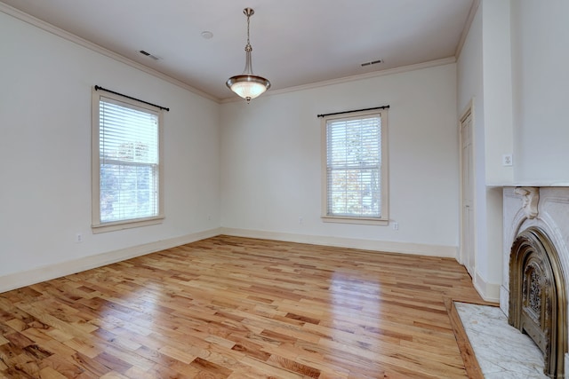 unfurnished dining area with light hardwood / wood-style flooring and plenty of natural light