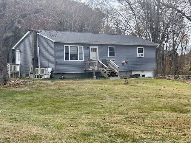 back of house featuring a yard