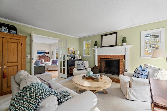 carpeted living room with a textured ceiling, crown molding, and a brick fireplace