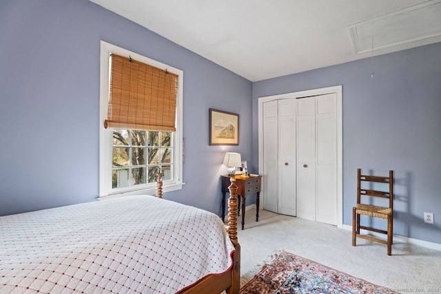 bedroom with carpet flooring and a closet