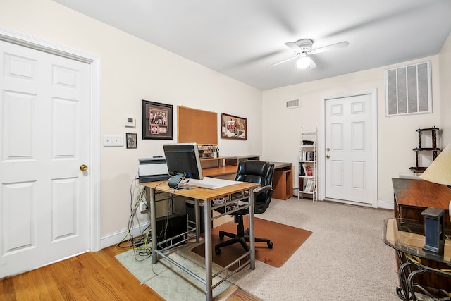 office featuring ceiling fan and light wood-type flooring