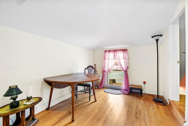 office space with light hardwood / wood-style flooring