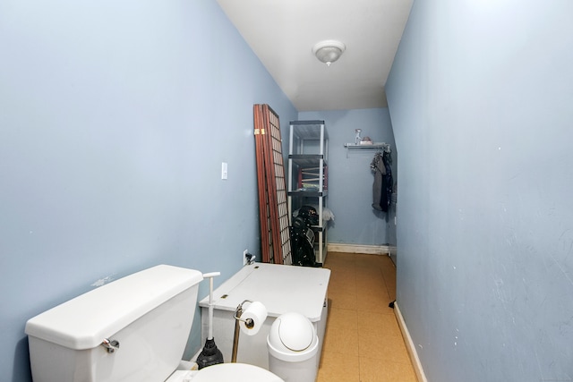 bathroom featuring toilet