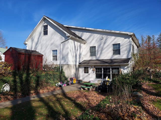 back of house featuring a patio area