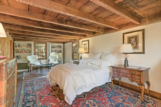 bedroom with beam ceiling and wooden ceiling