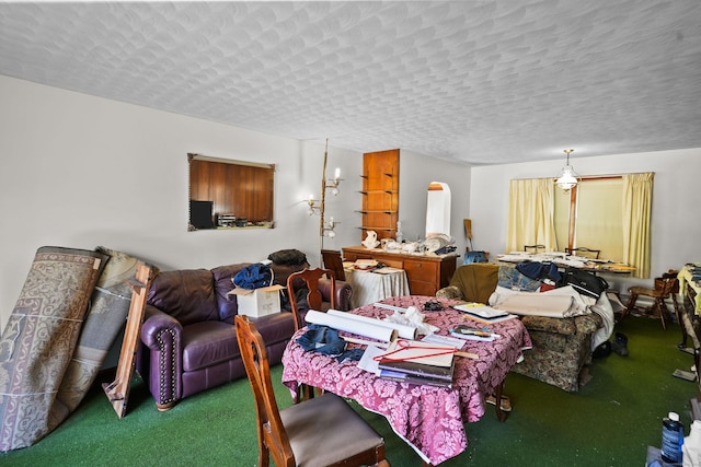 82 Pendleton Hill Rd, Voluntown, CT 06384 - carpeted dining room featuring arched walkways and a textured ceiling