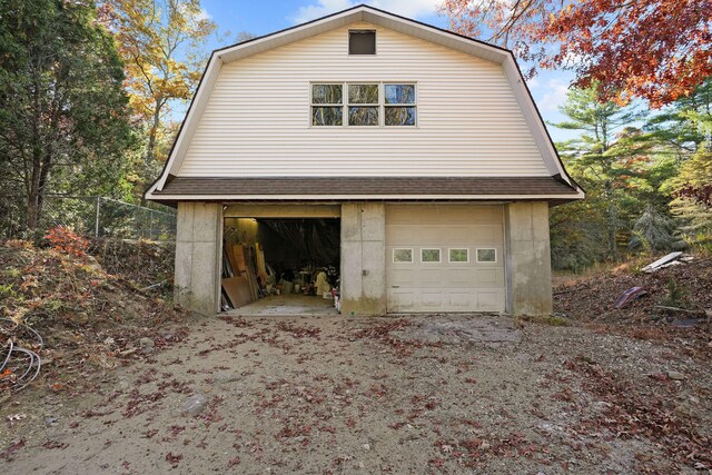 82 Pendleton Hill Rd, Voluntown, CT 06384 - view of side of property with a gambrel roof, a detached garage, and an outbuilding