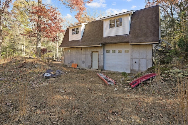 82 Pendleton Hill Rd, Voluntown, CT 06384 - view of home's exterior featuring a shingled roof and a garage