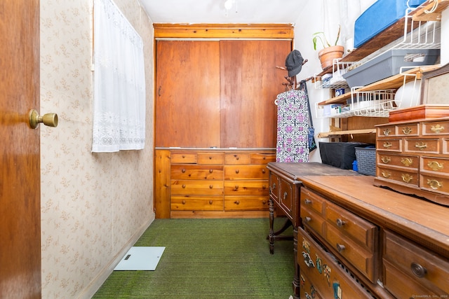 interior space featuring wallpapered walls