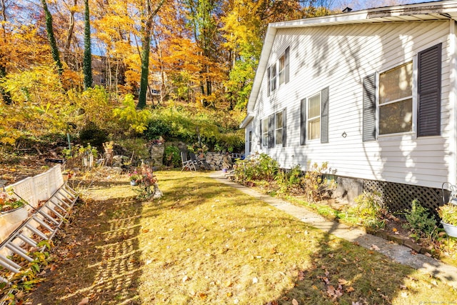 view of property exterior featuring a yard