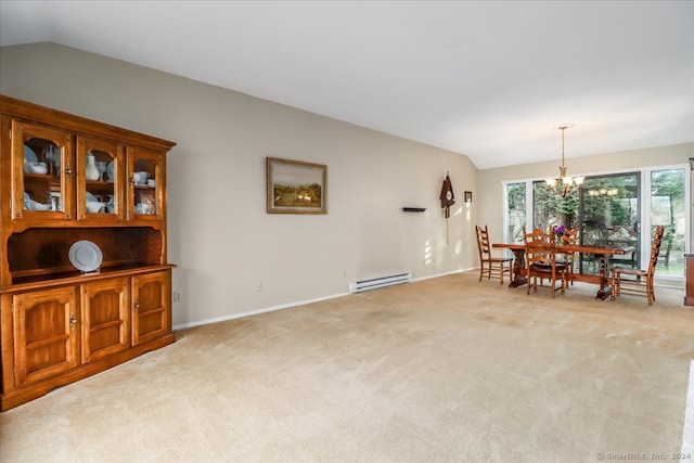 carpeted dining space with a baseboard radiator, lofted ceiling, and an inviting chandelier