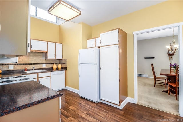 kitchen featuring dark wood-type flooring, white appliances, and white cabinets