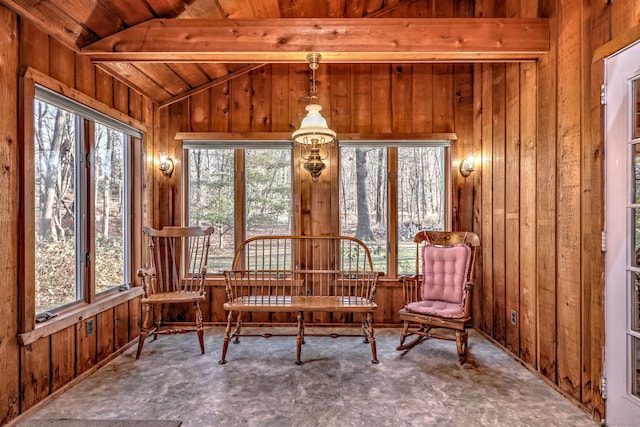 sunroom / solarium featuring lofted ceiling with beams and wood ceiling