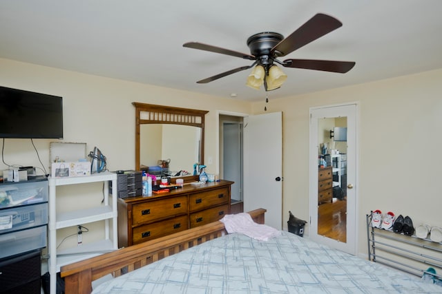 bedroom featuring light hardwood / wood-style flooring and ceiling fan