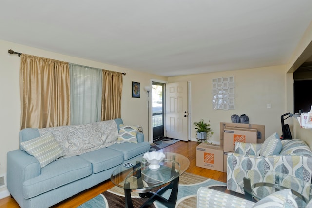 living room with light hardwood / wood-style floors