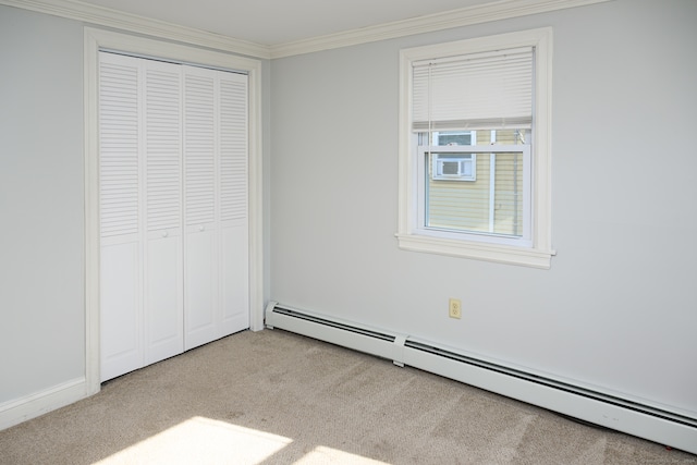 unfurnished bedroom featuring a closet, baseboard heating, and light colored carpet