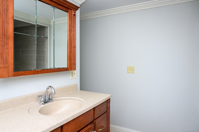 bathroom with vanity and ornamental molding