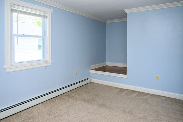 unfurnished room featuring ornamental molding, a baseboard heating unit, and light carpet