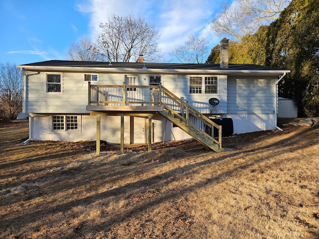 rear view of house with a deck