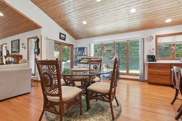 dining room featuring light wood finished floors, recessed lighting, wooden ceiling, and vaulted ceiling