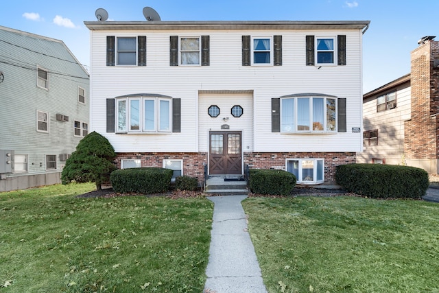 view of front of home featuring a front lawn