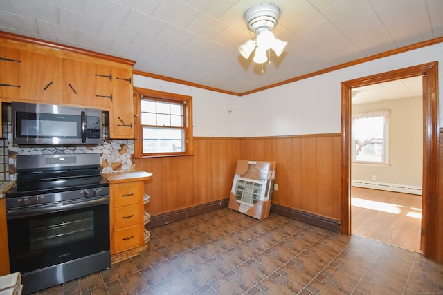 kitchen featuring a baseboard heating unit, dark hardwood / wood-style flooring, backsplash, crown molding, and stainless steel appliances