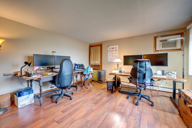 office with wood-type flooring and an AC wall unit