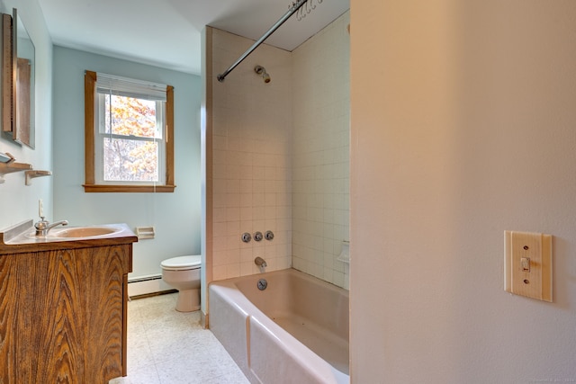 full bathroom with vanity, baseboard heating, toilet, and tiled shower / bath