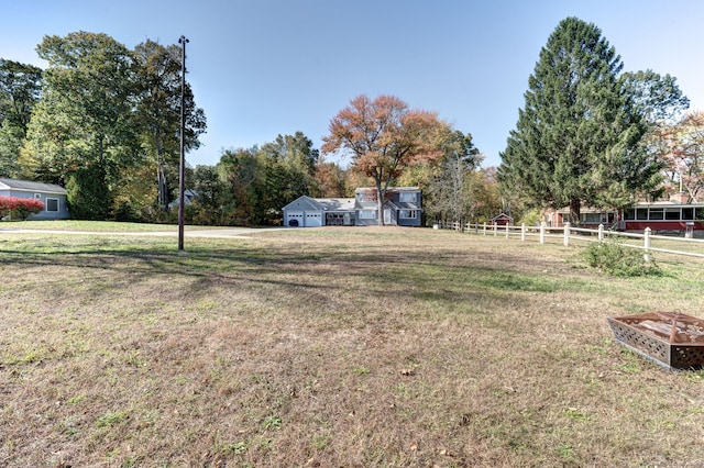 view of yard with a rural view