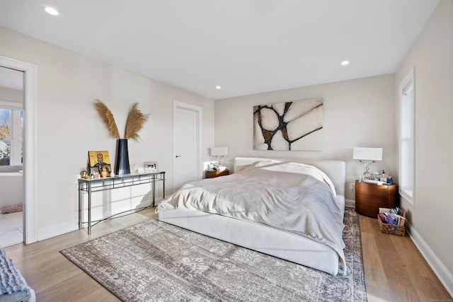 bedroom featuring light hardwood / wood-style flooring