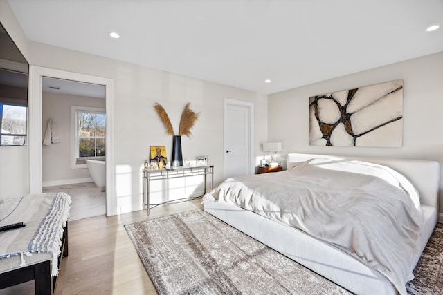 bedroom featuring light hardwood / wood-style flooring