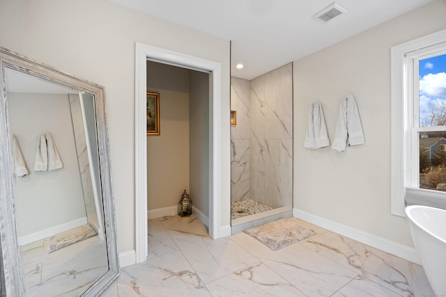 bathroom with shower with separate bathtub