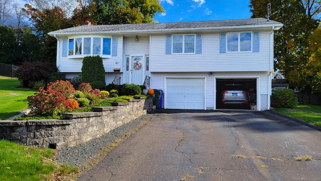 bi-level home featuring a garage