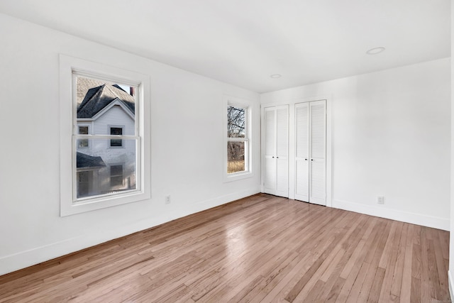 unfurnished bedroom featuring light hardwood / wood-style floors