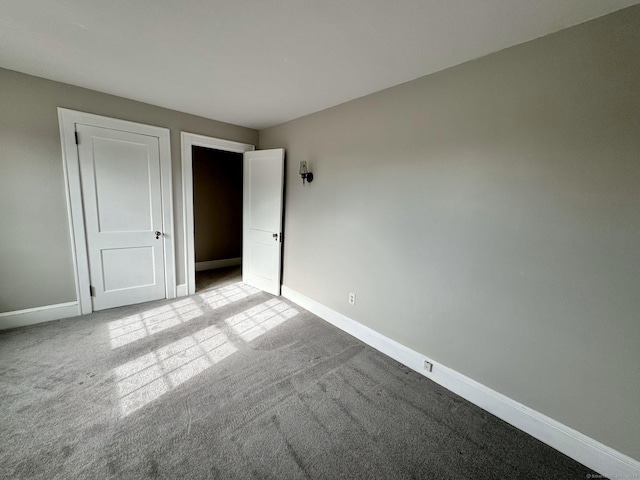 unfurnished bedroom featuring light colored carpet