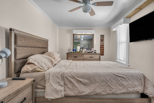 bedroom with crown molding and ceiling fan