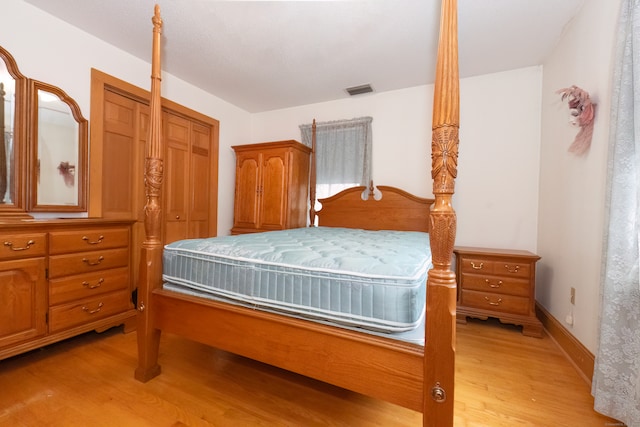 bedroom featuring light wood-type flooring