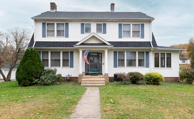 view of front facade with a front yard